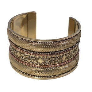 Rannekoru, messinki kuviolla